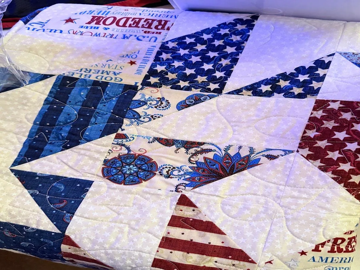 Handmade patriotic quilt displayed at the Blue Jean Ball