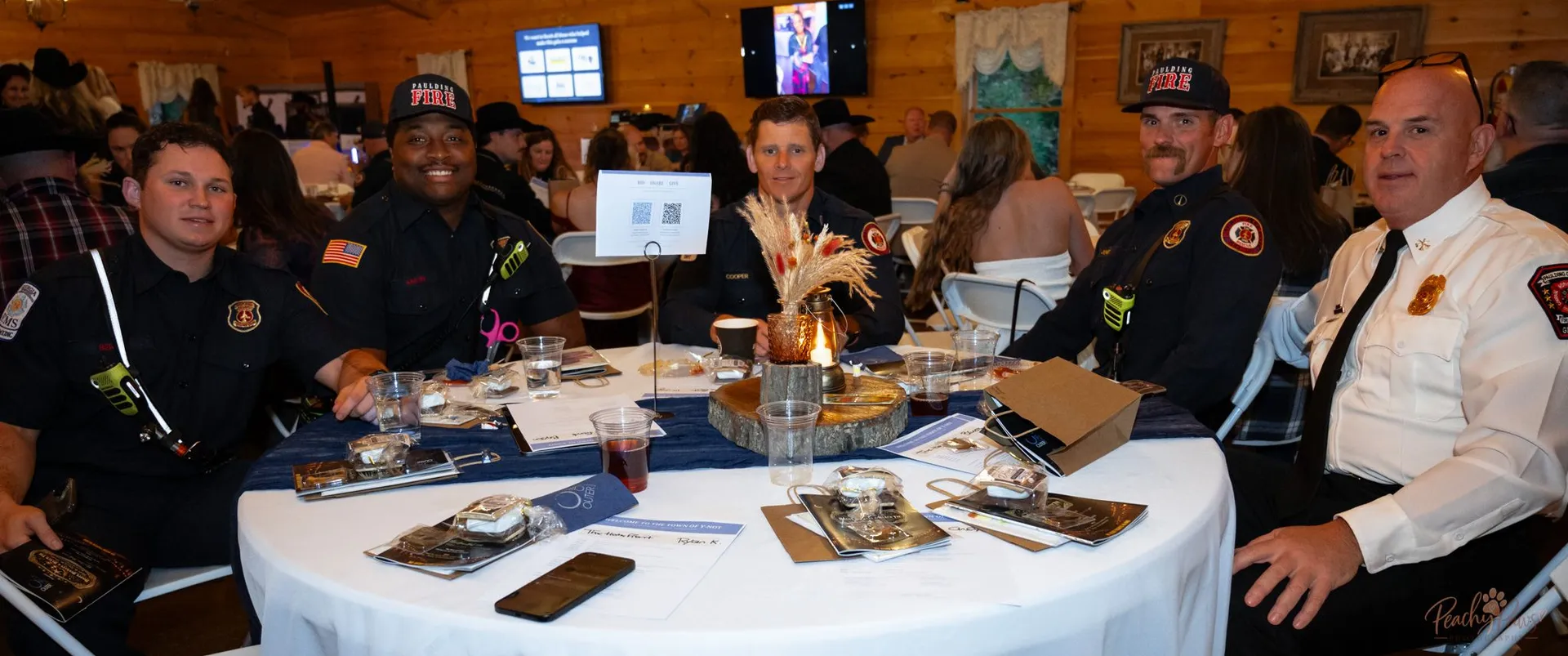 Paulding Fire crew sharing a table at the Blue Jean Ball