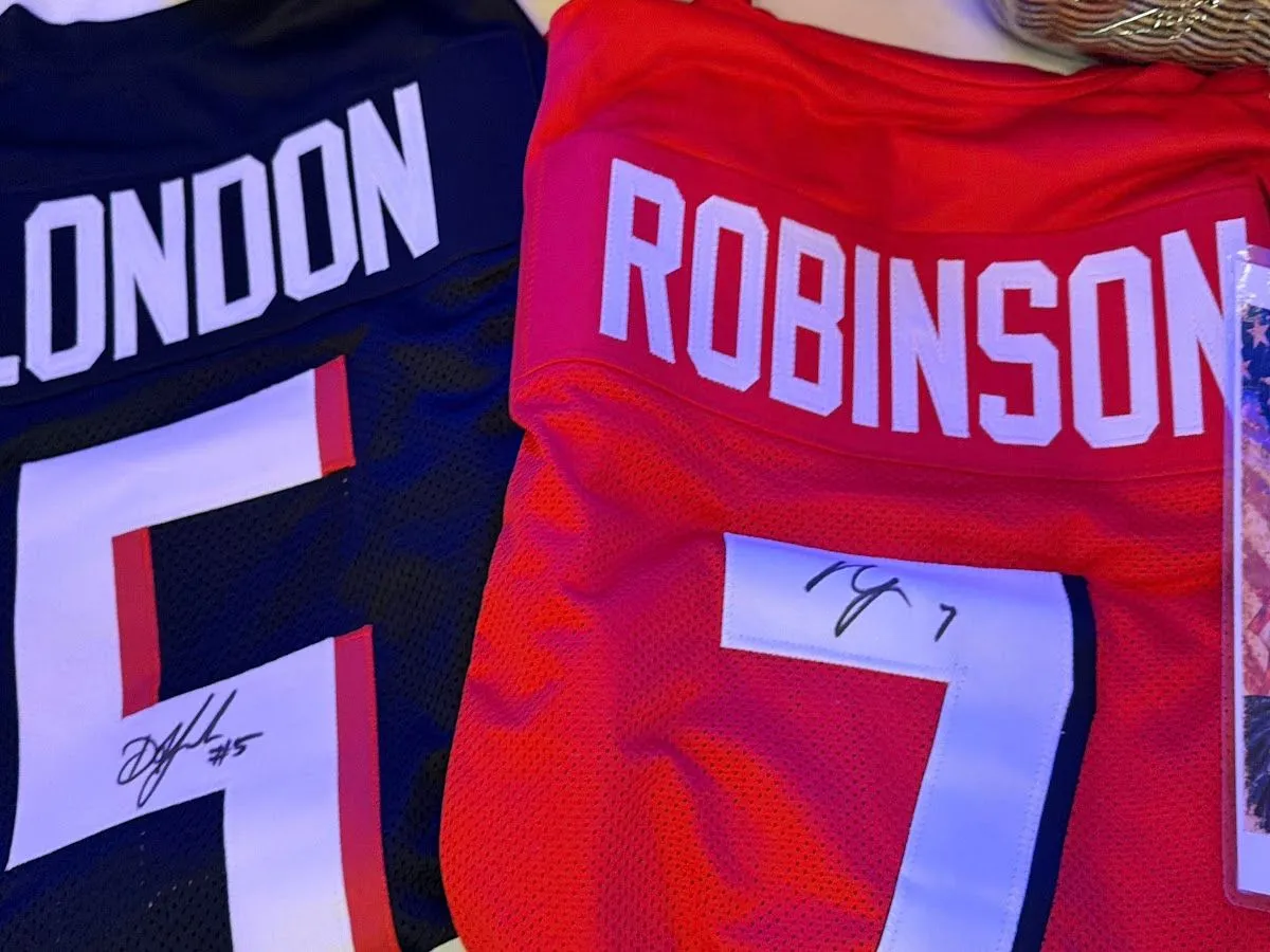 Close-up of signed football jerseys donated for the Blue Jean Ball